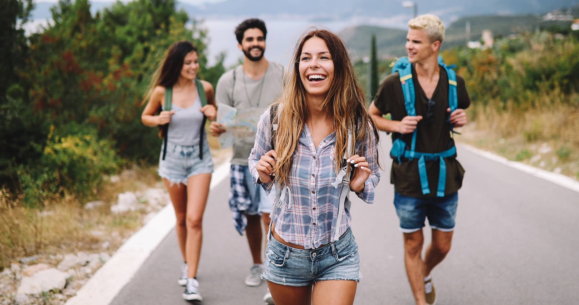 group-of-happy-friend-traveler-walking-and-having-RYXXANH.jpg